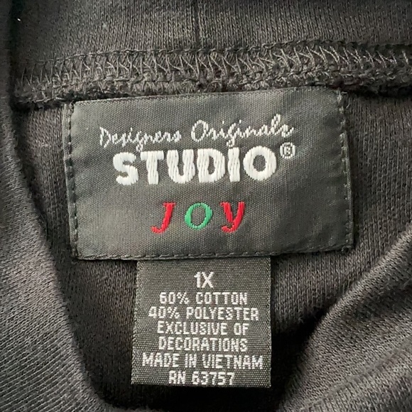 Black long-sleeve pullover top featuring a snowman applique - Picture 4 of 5